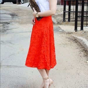 Bright orange lace lined A-line skirt